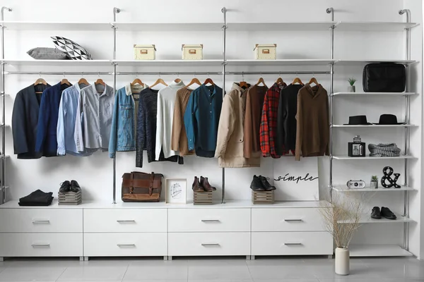 depositphotos_341631790-stock-photo-modern-wardrobe-with-stylish-winter